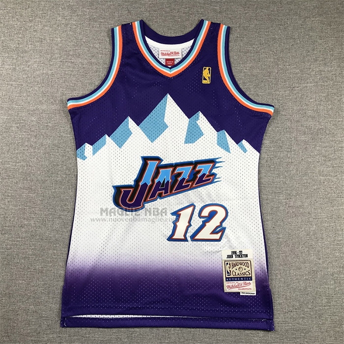 Maglia
 John Stockton NO 12 Bambino
 Utah Jazz Hardwood Classics Throwback 1996-97 Viola

